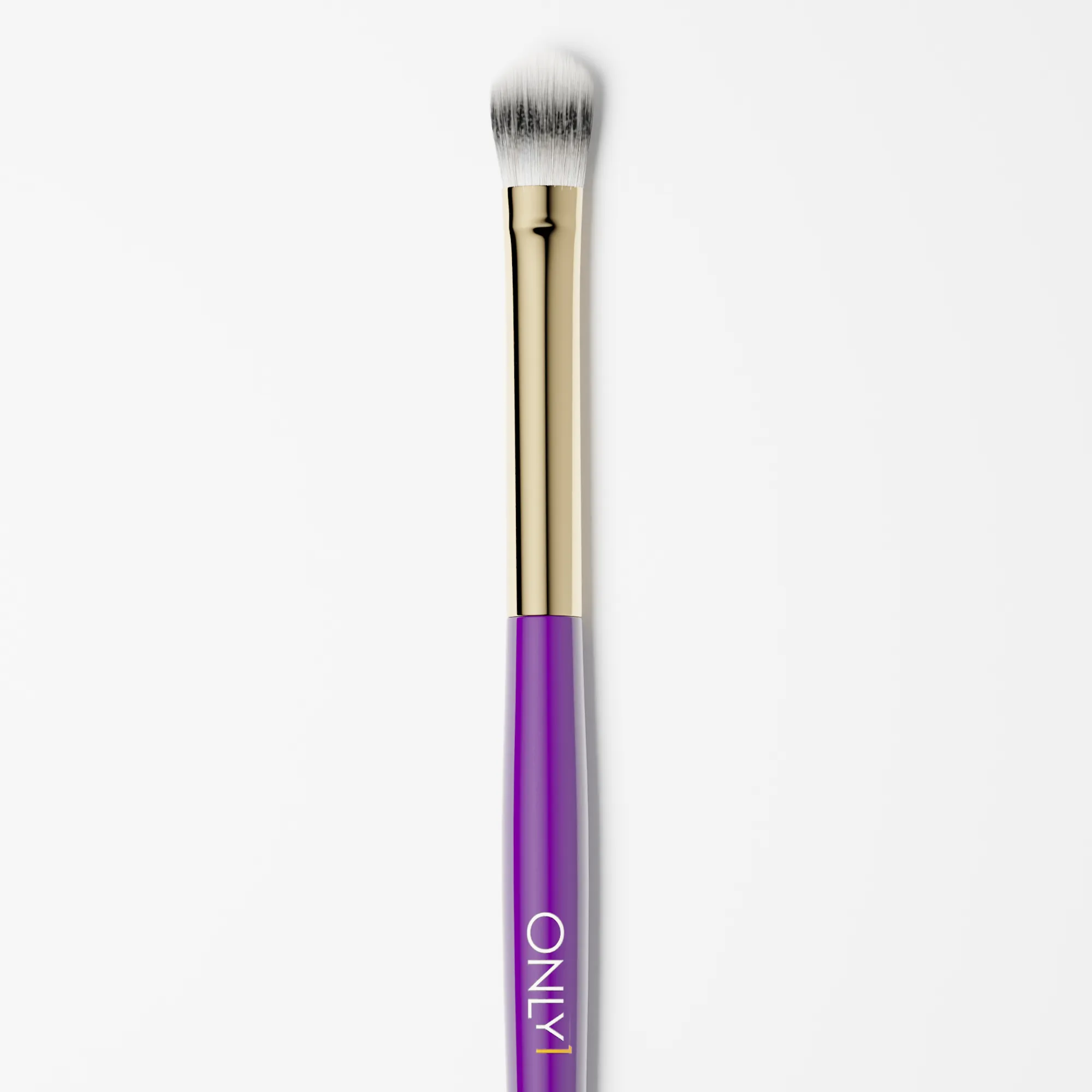 Purple and gold makeup brush with white bristles on a plain white background.