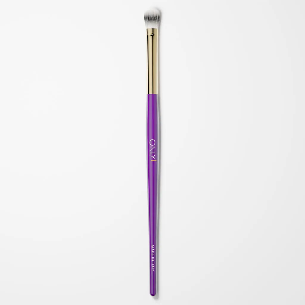 Purple and gold makeup brush with white bristles on a plain white background.