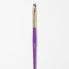 Purple and gold cat tongue makeup brush with white bristles on a plain white background.