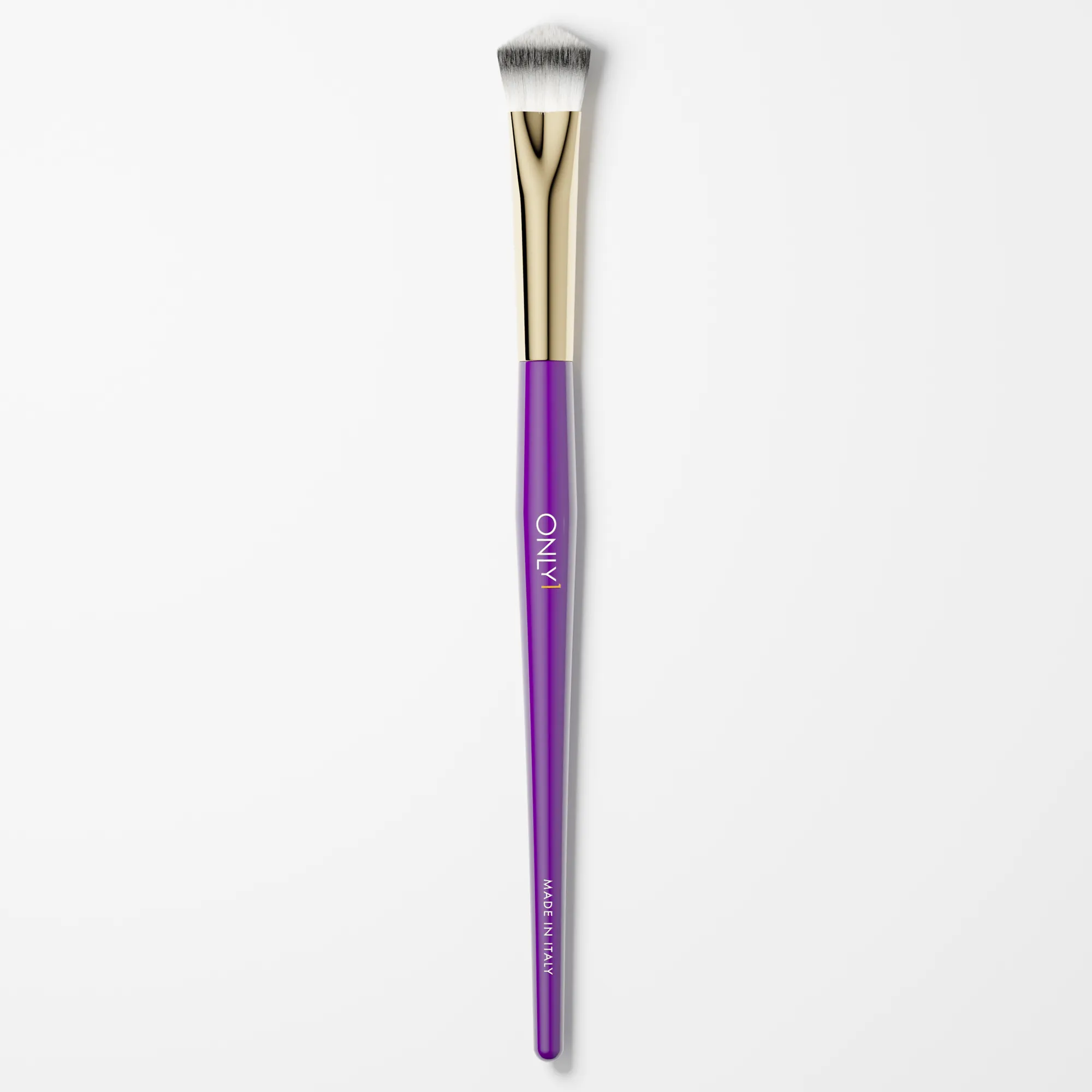 Small concealing brush with a purple handle, gold accents, and white bristles on a plain white background.