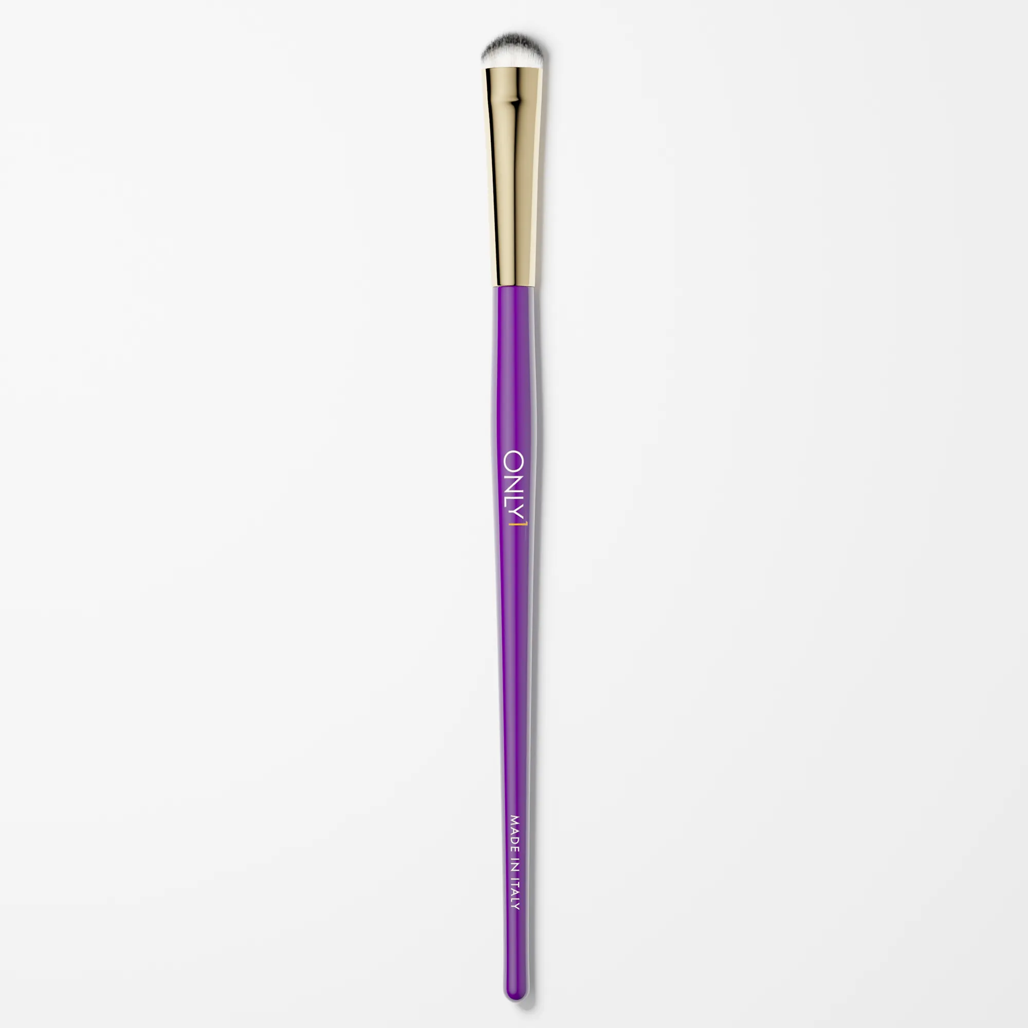 Dense shading brush with a purple handle, gold accents, and white bristles on a plain white background.