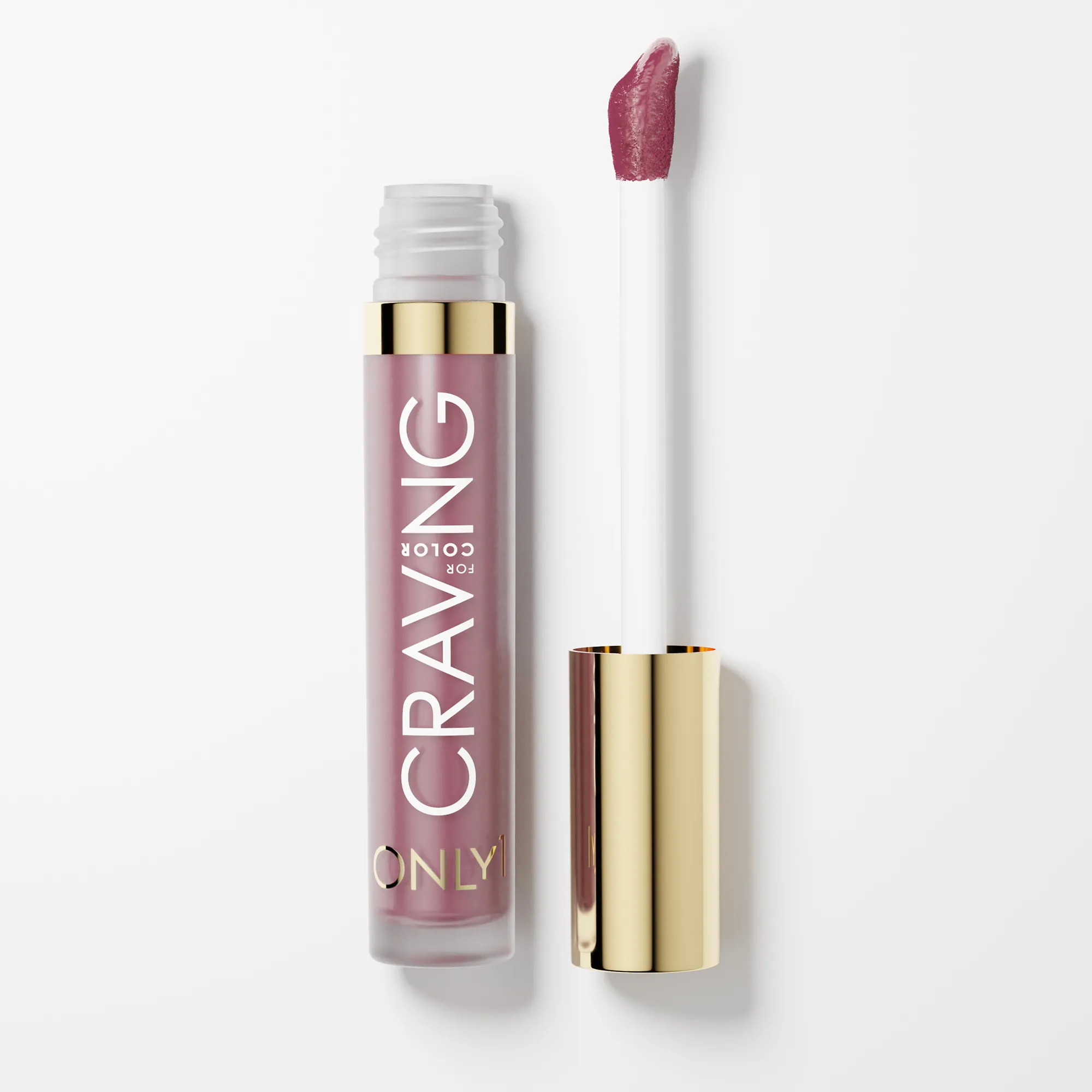A crawberry color liquid lipstick bottle with a red cap sits on a white background. Text on the bottle reads "CRAVING" all caps